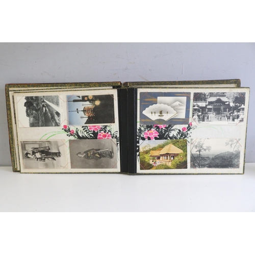 226 - One lacquered album containing Japanese postcards