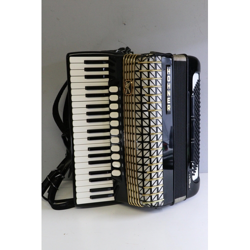 540 - Hohner atlantic IV musette accordion and blue rexine case