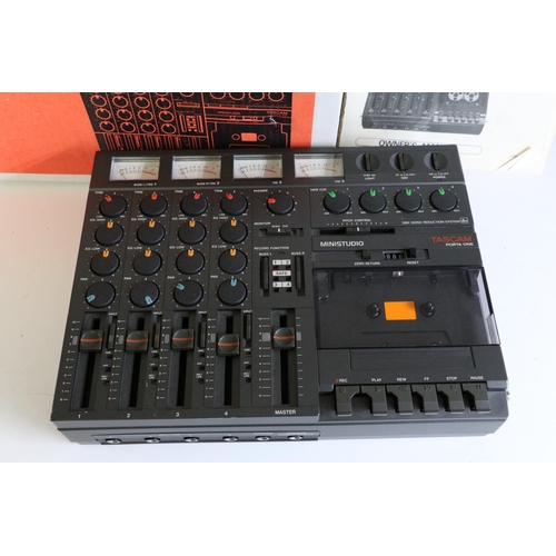 543 - Tascam ministudio Porta One battery operated recording suite boxed with instructions, untested.