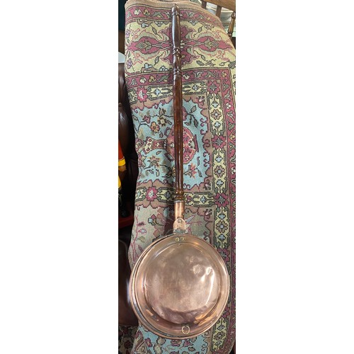 287 - Pair of brass candlesticks, copper kettle and brass trivet and copper warming pan