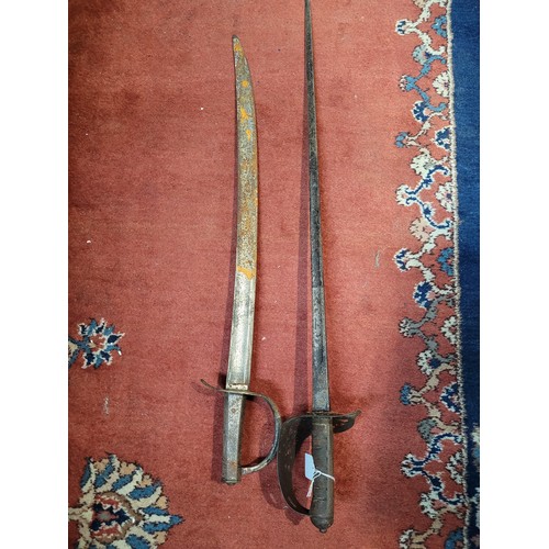 203 - Antique Victorian sword together with a sabre