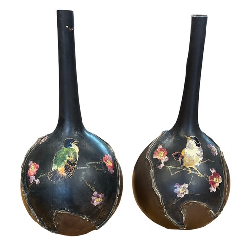 47 - A pair of Bretby vases with damage repair. Approx 32cm tall.