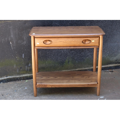 80 - Ercol ''golden dawn'' hall table fitted single drawer to base.