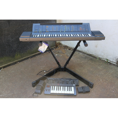 88 - A Yamaha PS-6100 keyboard (no cable), a Think-V keyboard stand, a Roland FC-7 Foot controller, an Ev... 