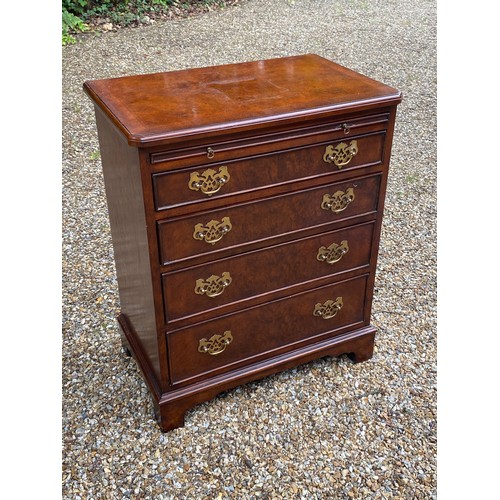 145 - Reproduction four drawer chest with brush slide