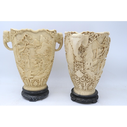 186 - Pair of decorative oriental resin vases in an elephant design