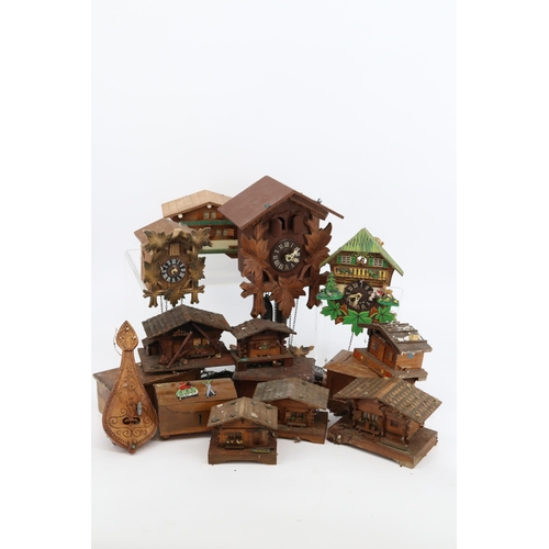 231 - Selection of cuckoo clocks and wooden musical boxes.