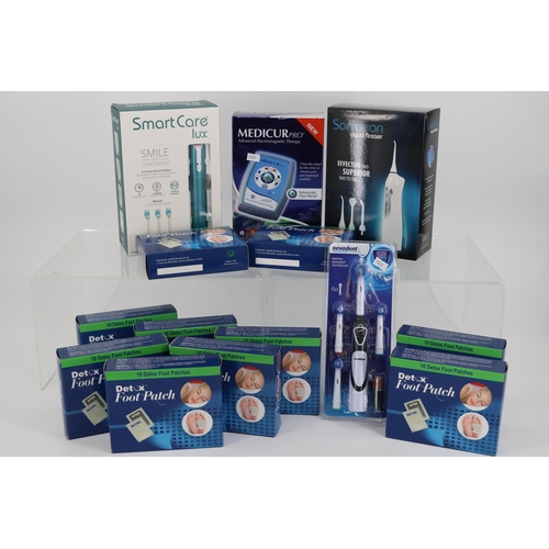 277 - Selection of new and original packaging items to include Soniclean Aqua flosser, Smartcare Lux elect... 