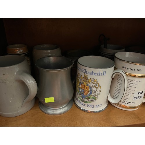 85b - A collection of beer tankards, Steins and bar ornaments.