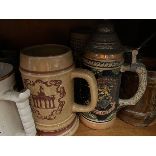 85b - A collection of beer tankards, Steins and bar ornaments.