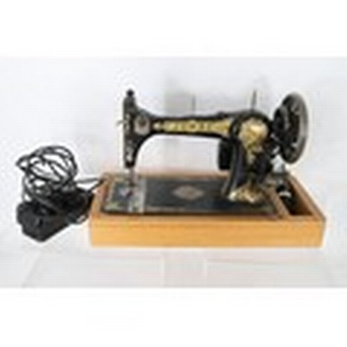 27 - A vintage Jones Medium CS  electric sewing machine.(Trade Spares or Repairs)