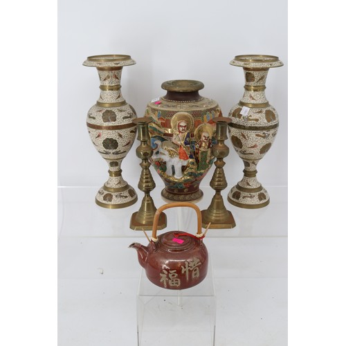 102 - brass candlesticks and an oriental vase, pair of ornate brass vases.