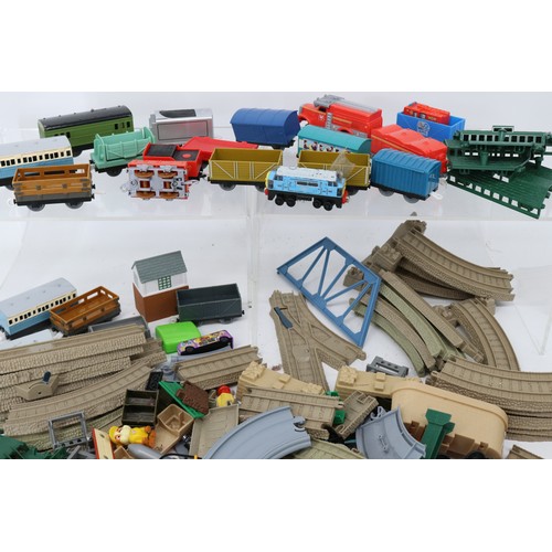 202 - Large selection of battery operated Trains, tracks and accessories (inside lot 201)