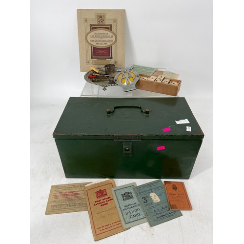 302 - Box of ephemera together with a silver napkin ring, green painted tin, first aid box.