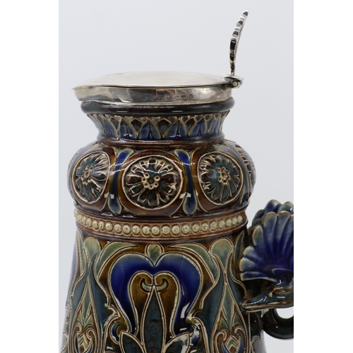 272 - A Doulton Lambeth stoneware silver topped jug with entwined peacock handle (approx. 30cm tall) Noted... 