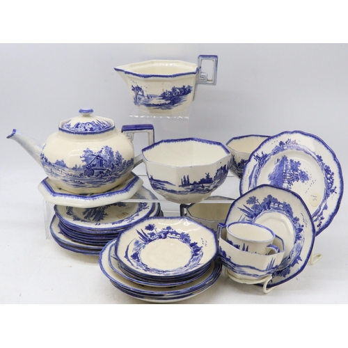 704 - A selection of Royal Doulton Norfolk Pattern tableware to include Teapot, cups, saucers, sideplates ... 