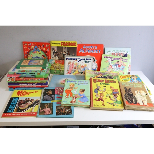 724 - Quantity of assorted children's books (some vintage) to include annuals, pop up books etc