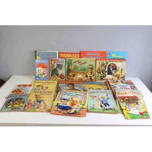 724 - Quantity of assorted children's books (some vintage) to include annuals, pop up books etc