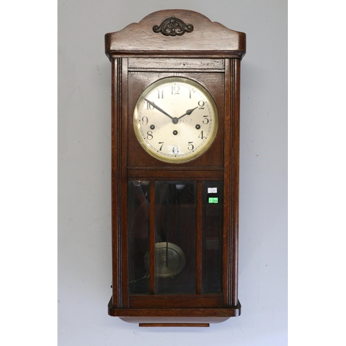 729 - Westminster chiming wall clock with key and pendulum