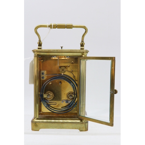 206 - Brass cased carriage clock with alarm.