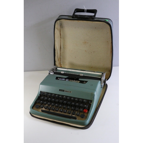 580 - Rexine cased Olivetti Lettera 32 typewriter