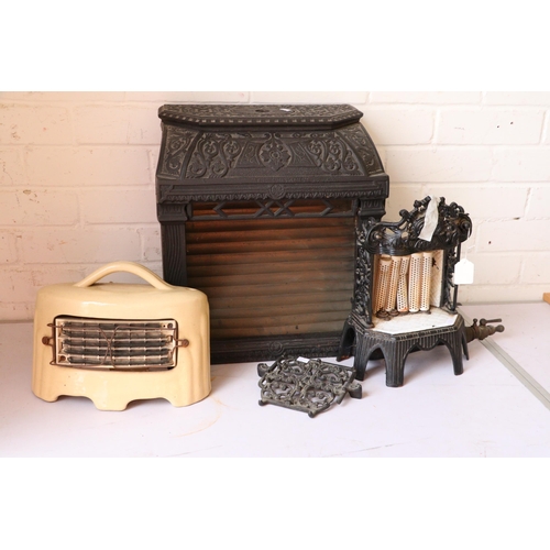 630 - Vintage cast gas? decorative fireplace together with a smaller similar and another ceramic cased hea... 