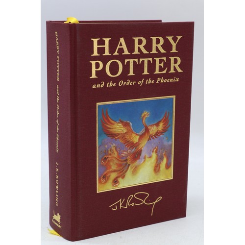 103a - Boxed Harry Potter hard backed books, Including Philosphers stone, Chamber of secrets, Prisoner of A... 