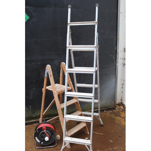 18 - Selection of garden tools, wooden decorative ladders, 3 way aluminium ladder and continental extensi... 