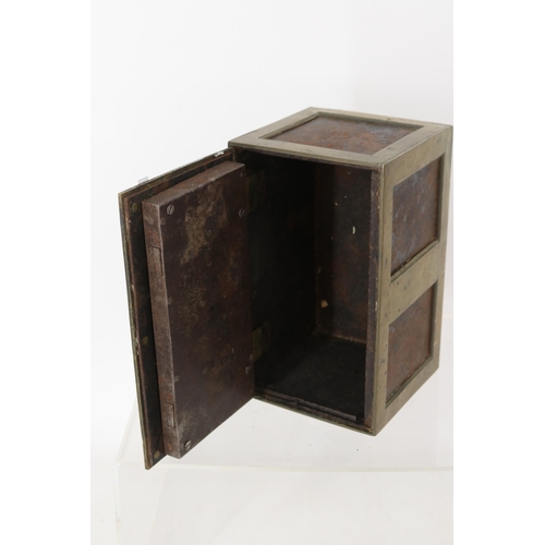 34 - A small cupboard safe with key. Measures approx' 26 x 15 x 15cm.