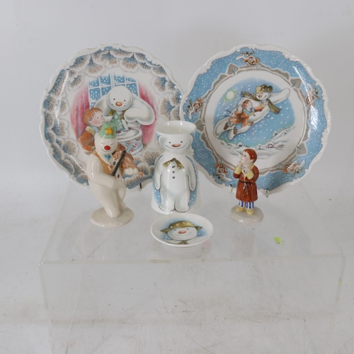 43 - A collection of Royal Doulton Snowman ceramics, including; James, dish, egg cup, Violinist Snowman, ... 