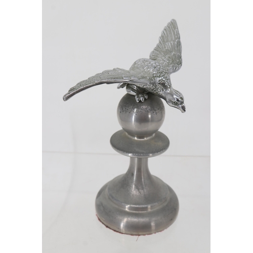 50 - A weighted metal desk paperweight of a bird on plinth.