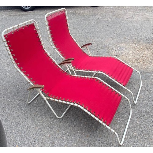 16 - Pair of vintage Richard Henkel sun loungers, replaced coverings at some point. Frames showing wear a... 