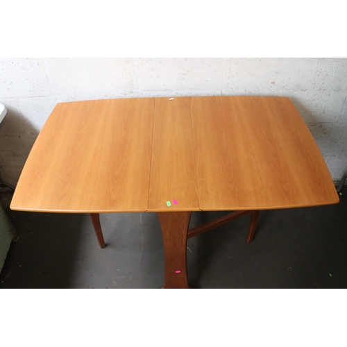 94 - Legate furniture drop leaf table measuring approx 75cm Wide x 123cm extended.