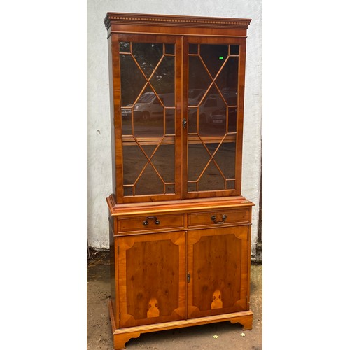 96 - Reproduction yew wood bookcase over cupboard base.
