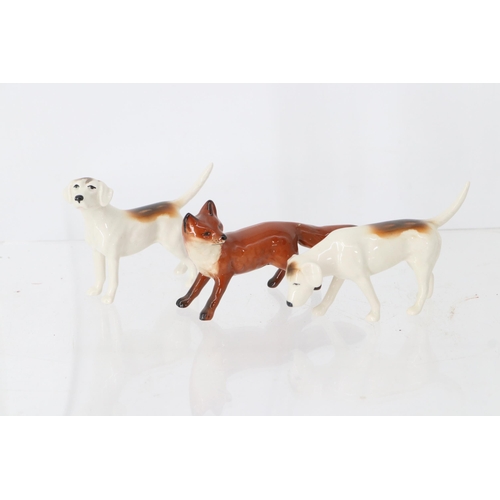 98 - Pair of Beswick Beagles and a Beswick fox with a broken/repaired tail.