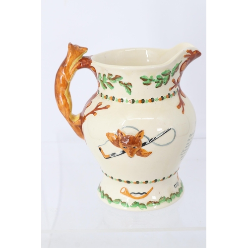 123 - A Crown Devon Fieldings musical jug featuring Mr Peel and a fox handle. Together with other ceramics... 