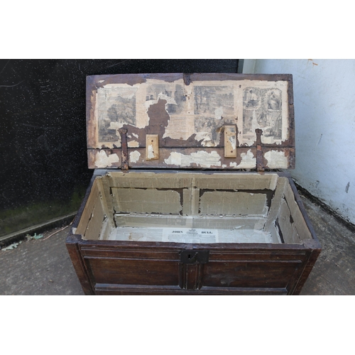 131 - An antique oak coffer with original newspaper lining, some dated 1832. It measures approx' 100W x 46... 