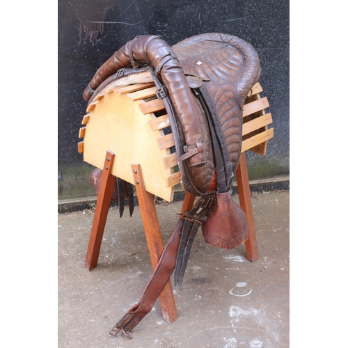 168 - Argentinian Gaucho  saddle made in 1983 together with a saddle stand.