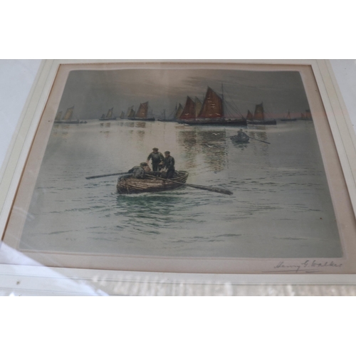 216 - A pair of Henry George Walker tinted etchings. Each measure approx 47 x 39cm in frame.