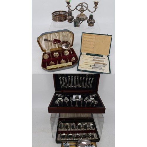 240 - Canteen of cutlery, cased cutlery sets, plated wine coaster etc