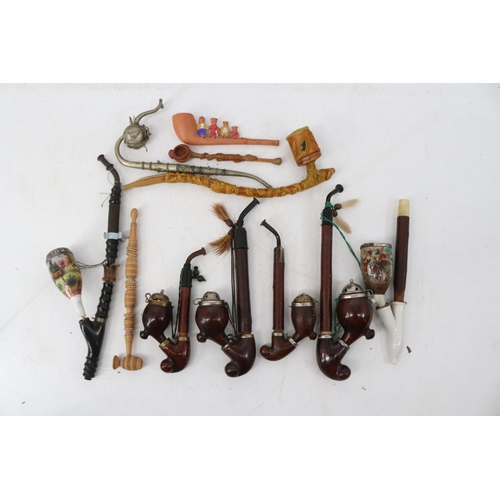 241 - A selection of Smokerama consisting of oriental, eastern and continental pipes (inspect)