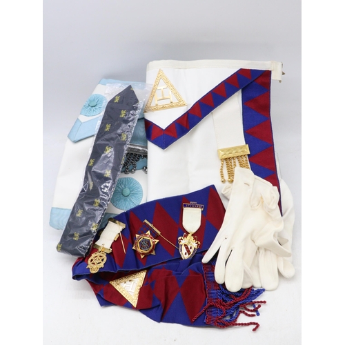 248 - A quantity of masonic aprons, jewels etc