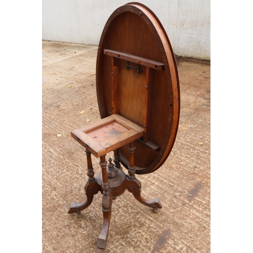 283 - Small Victorian walnut tilt top table, Inlaid satinwood and ebony on four legged base.