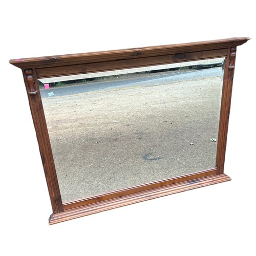 311 - An over-mantle style mirror measuring approx 110w x 81cmH