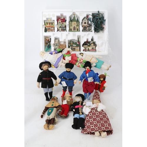 315 - Boxed christmas decoration together with handmade world dolls.