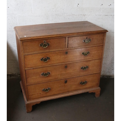 331 - Antique, two over three oak chest of drawers.