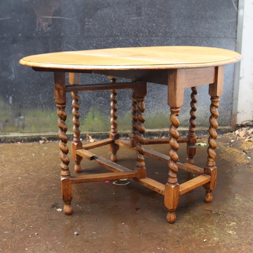 384 - Oak gate leg table with barley twist legs