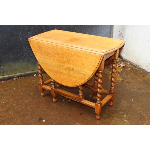 384 - Oak gate leg table with barley twist legs