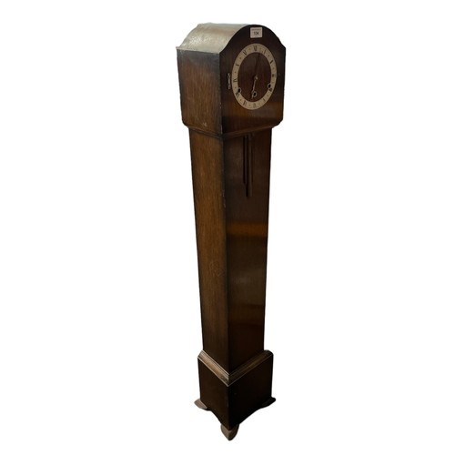 104 - Vintage oak utility grandmother clock. Note- missing back door to movement. No weights.