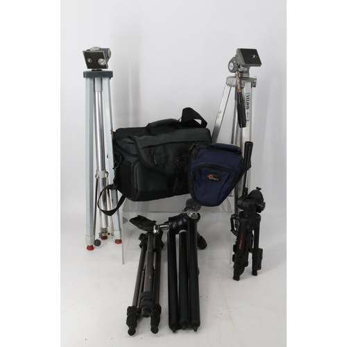 445 - Selection of camera tripods together with two Lowepro camera bags.